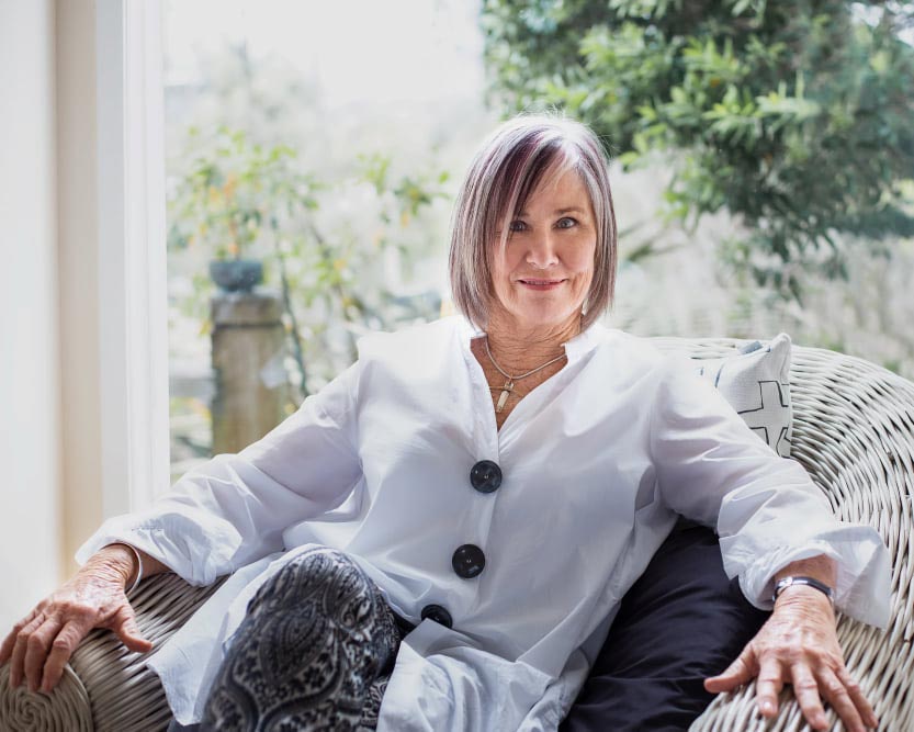 Rosemary Nelson New zealand's Feng SHui Designersitting in her home.